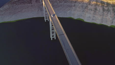 suspension bridge over the reservoir of iznájar, córdoba, spain