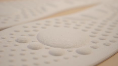 close-up of white orthotic insoles
