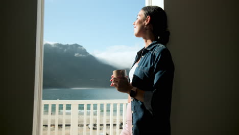 woman enjoying morning coffee on balcony, feeling sunlight on face, copy space