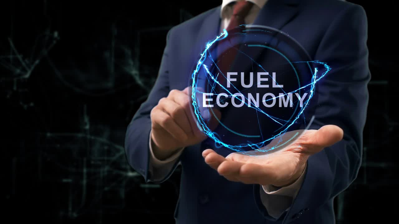 Businessman shows concept hologram Fuel Economy