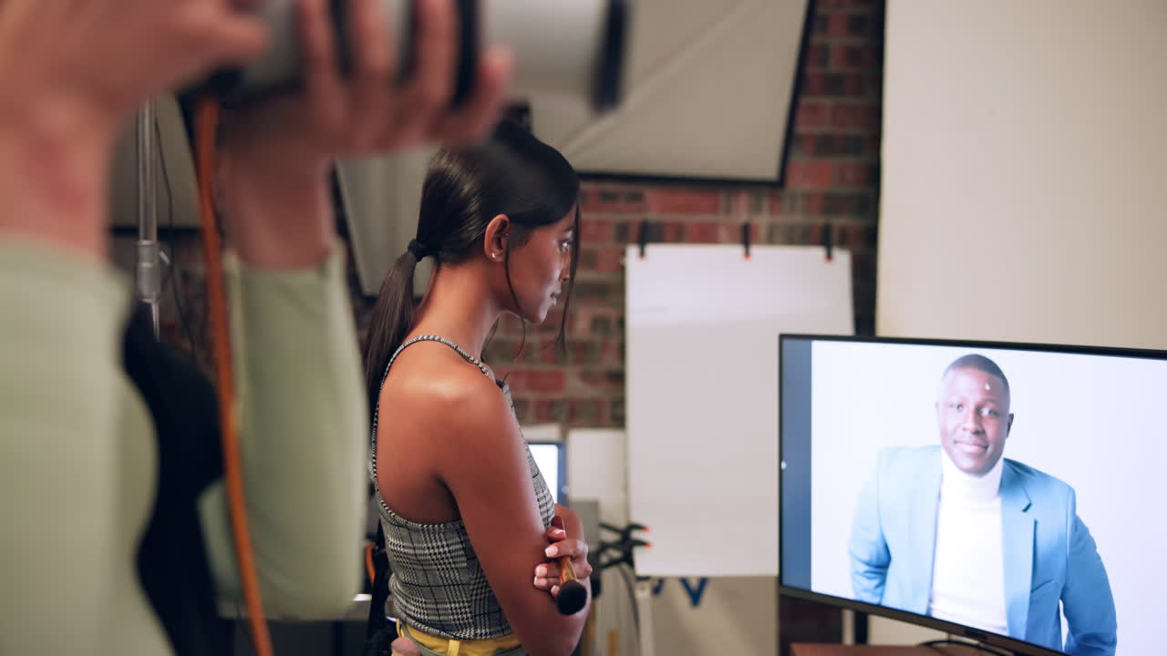 Behind the scenes of a photo shoot with a model and photographer