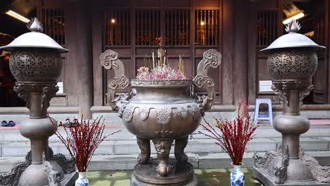 incense burning at a temple in hanoi