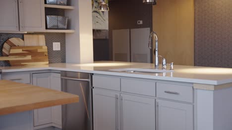 sink faucet in a modern kitchen in a downtown condo building in minneapolis