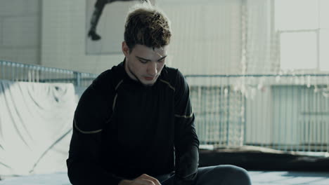 Athlete preparing for training session and having a break