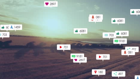 social media notifications animation over scenic countryside landscape at sunset
