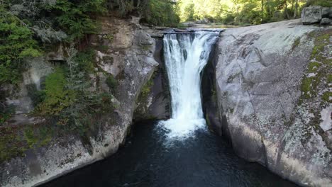 aerial push in to elk river falls in elk park nc, north carolina