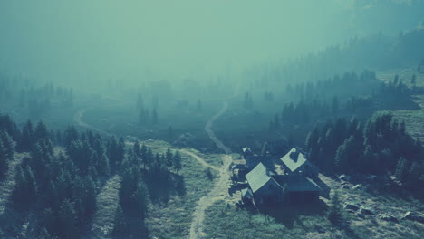 Old-wooden-village-on-the-rocky-mountain-background