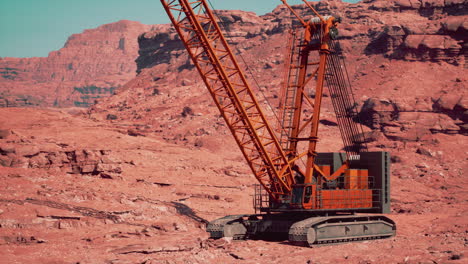 large orange construction crane in desert