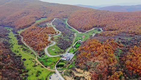 serpentine roads weave through kosovo autumn hills near bear sanctuary prishtina