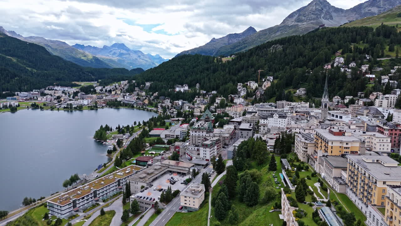 Aerial view of Saint Moritz city and lake, surrounded by mountains