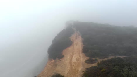 misty morning at cliffs of european coastline next