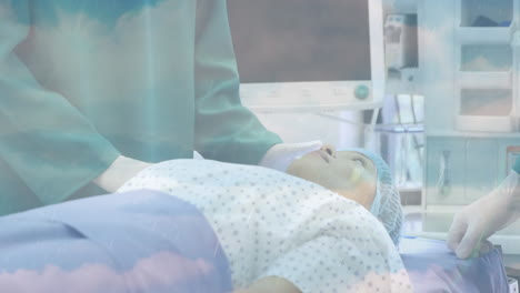 animation of clouds and sky over surgeons wearing face masks in hospital