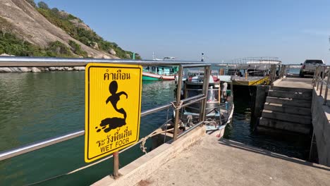 sequential frames showing a waterfront construction zone.