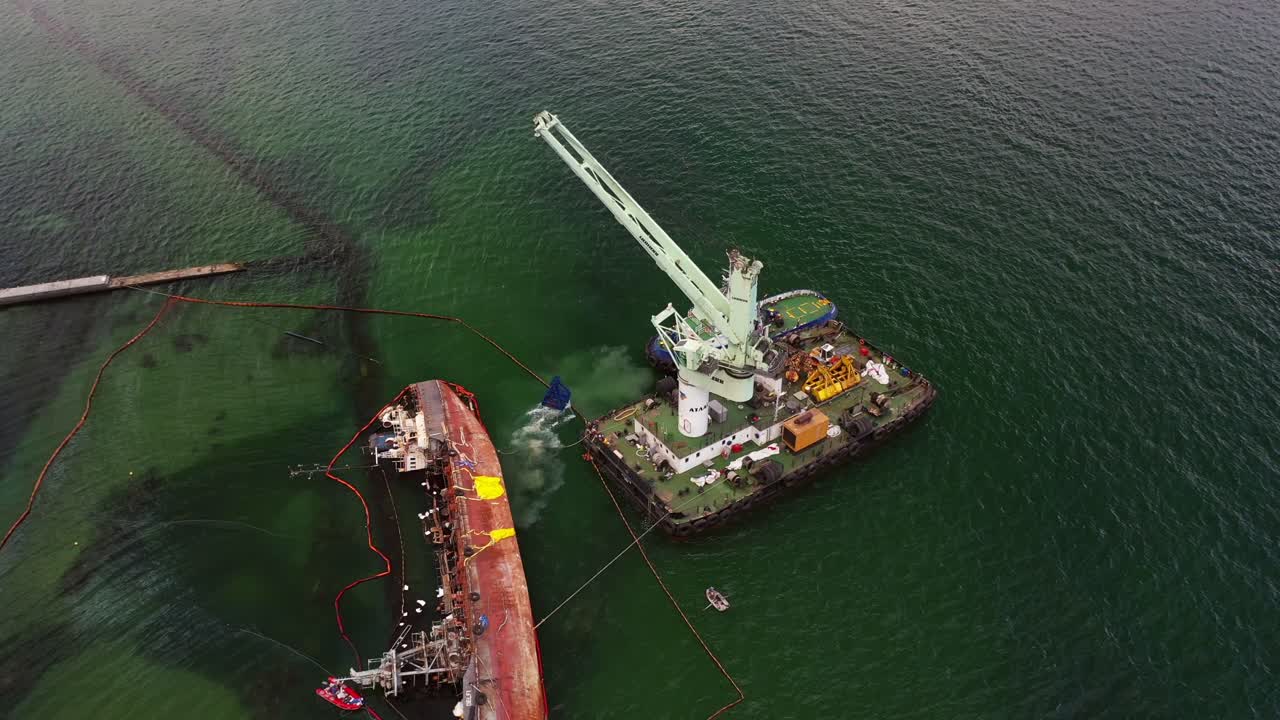 Shipwreck Salvage Operation with Pollution Cleanup