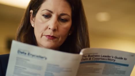 business woman reading a data encryption guide