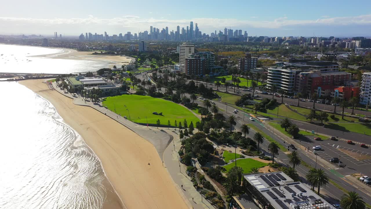 Panning aerial footage of St Kilda Beach, South of Melbourne's Central Business District