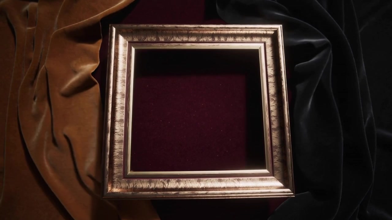 Rotating gilded frame sliding to center in studio on play, showing burgundy golden and black velvet