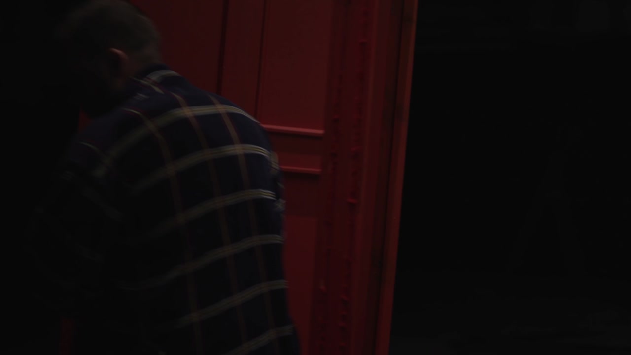 Man Facing an Unknown Door