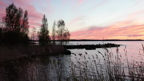 crimson sunset on the background of the gulf of bothnia