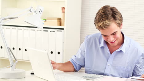 Young-businessman-working-from-home