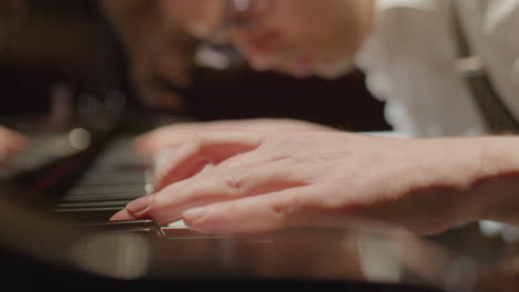musician playing fast piano song