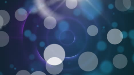 animación de puntos de luz sobre círculos azules con patrón de fondo