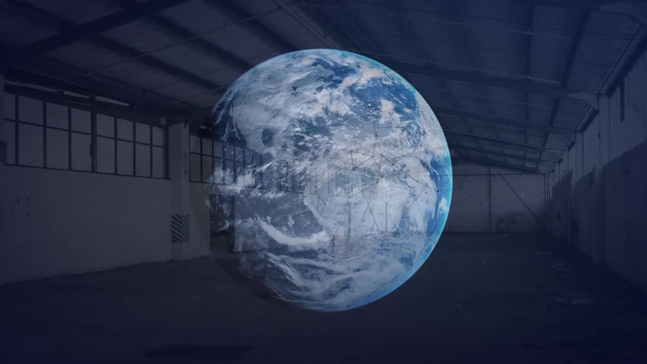 방치된 창고 위에서 선과 회전하는 지구를 연결하는 점들의 애니메이션