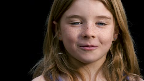 young girl being silly and flaring her nostrils