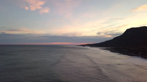 sunset drone shot of the west coast of the south island