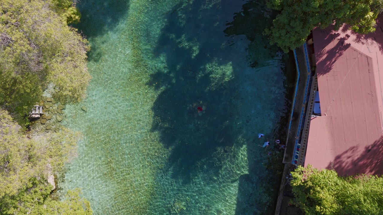 Aerial View Of The Clear, Blue Waters Of Monumento Natural Las Marias In Neiba, Dominican Republic. - descend shot