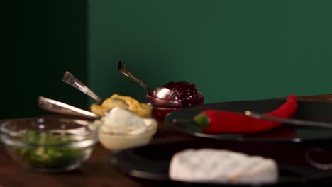 preparing camembert with dips and sauces