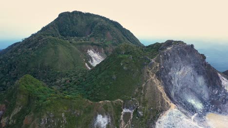 aerial shot of lush green part of mount sibayak in north sumatra, indonesia