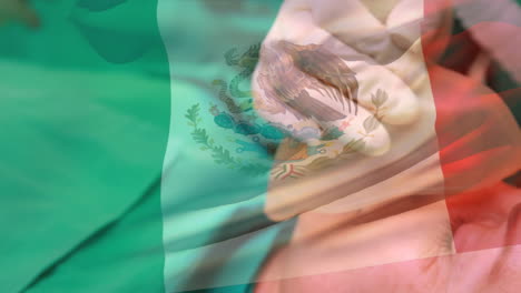 animation of flag of mexico waving over surgeons in operating theatre