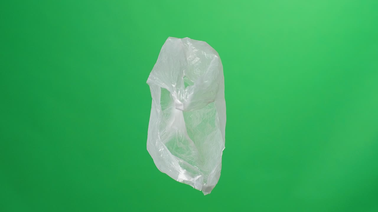 Plastic Bag Rotating On Green Screen Background