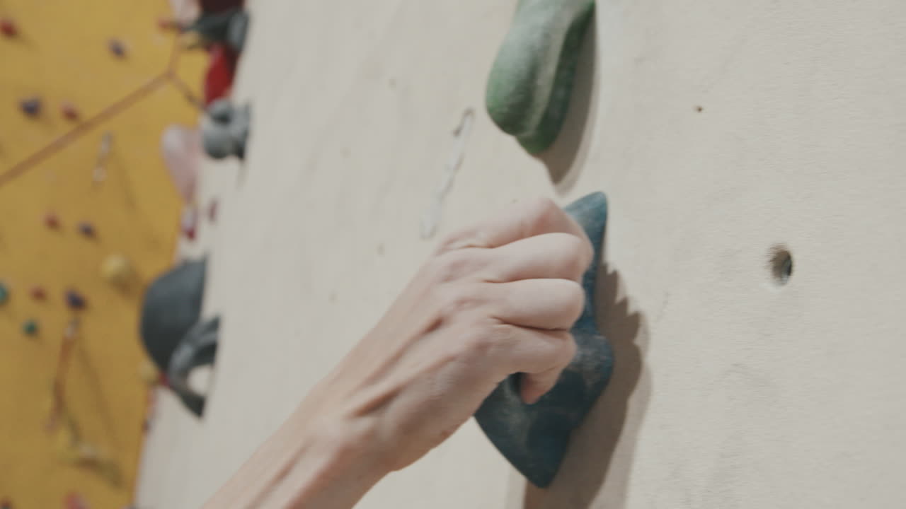 Man Climbing Wall Indoors