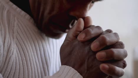 man-praying-to-god-with-hands-together-Caribbean-man-praying-with-white-background-stock-videos