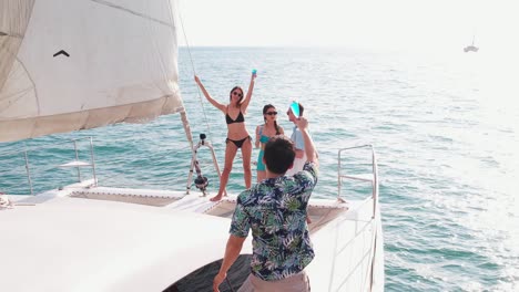 friends celebrating on a yacht