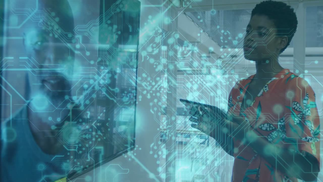 Woman tapping tablet and swiping, driving remote tech while linking wall-screen with blue overlay