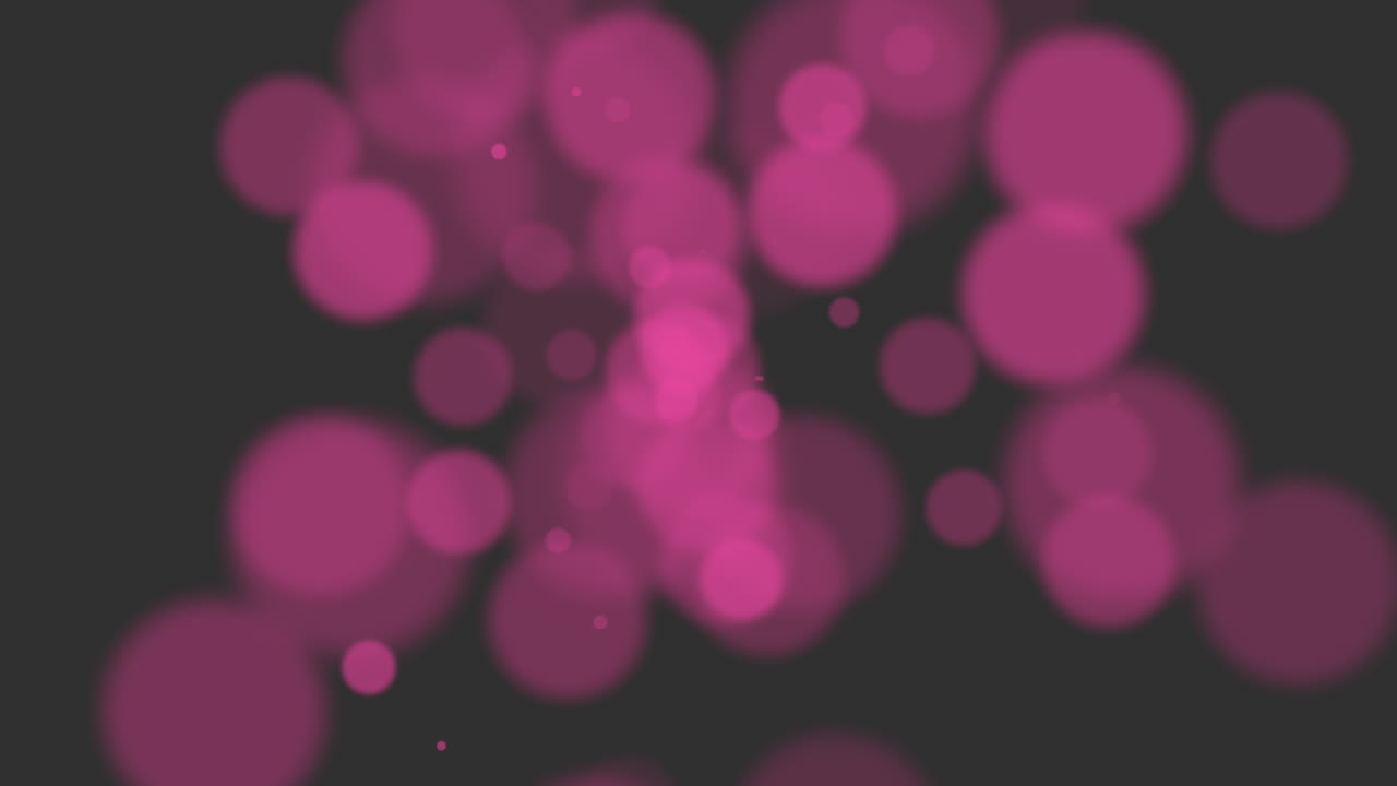 Premium stock video - Fly small red particles and round bokeh on black ...