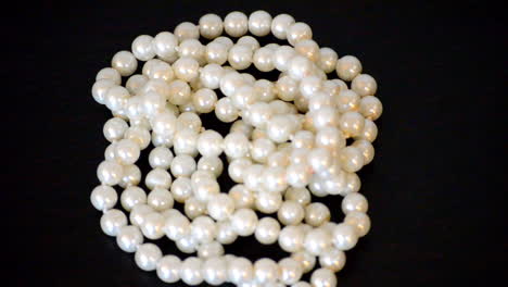 pearl necklace on table