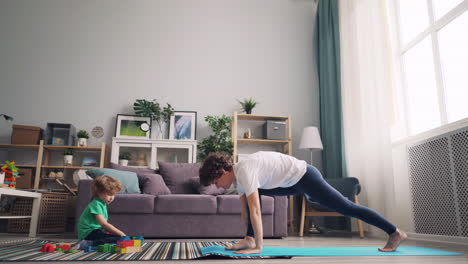 mother and child practicing yoga at home