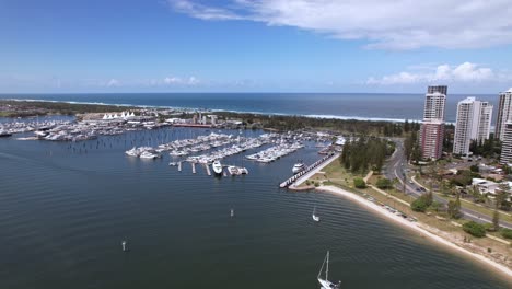 Mariner's Cove Marina And Jack Gordon Park In Main Beach, Queensland, Australia. aerial sideways shot