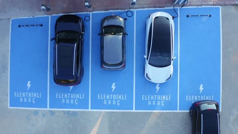 Electric-vehicles-charging-at-car-supercharger-station