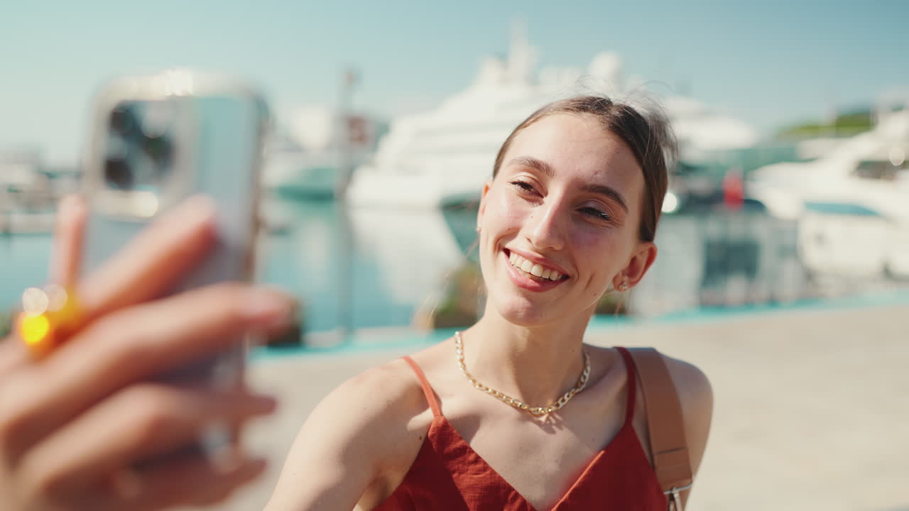 Woman Taking Selfie in Marina