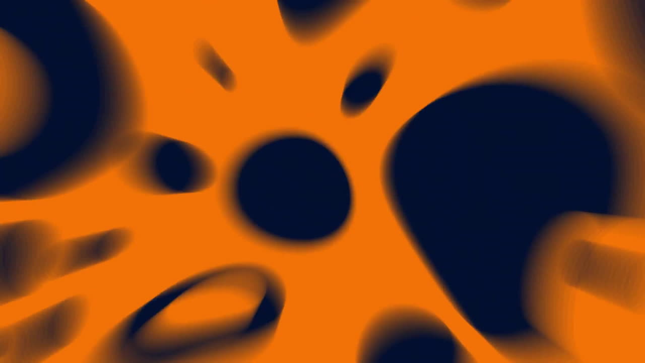 Abstract animation with black irregular shapes over orange background