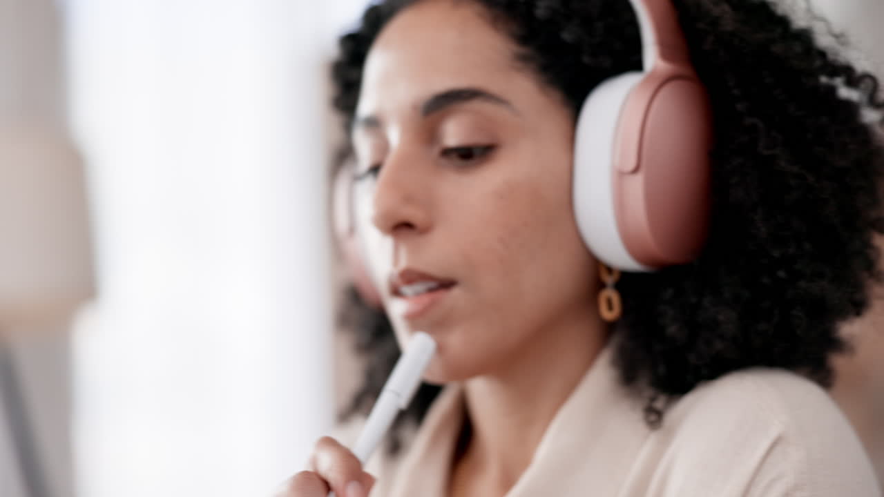 Business woman, laptop and thinking in headphones