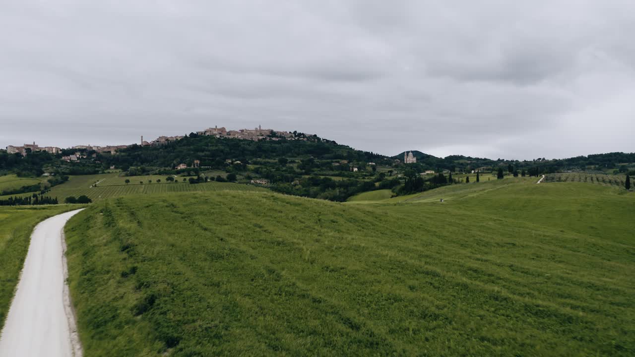 Drone shot flying over Italy's rural agriculture
