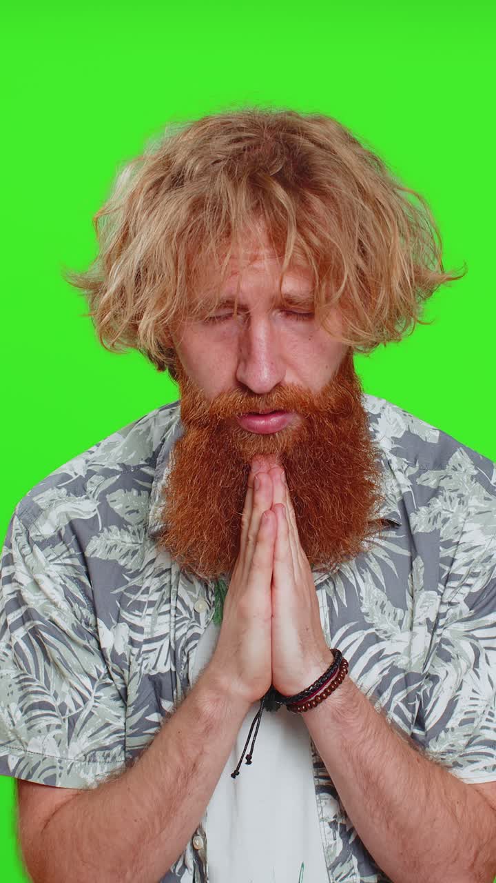 Caucasian sad man praying making wish asking hopeful help begging apology meditation imploring