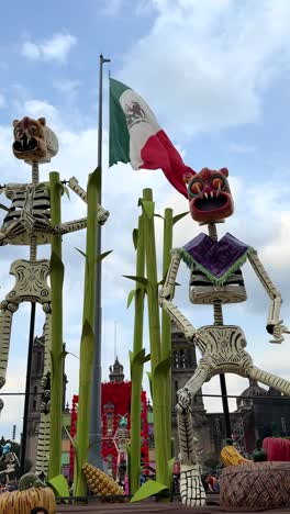 giant calaveras and ofrenda for dia de muertos in mexico city