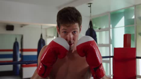 caucasian man boxing in boxing gym